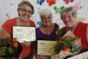 Val Lay, 65, Lorraine Bidewell, 63, and Judith Kerr, 68 were presented with certificates and flowers
