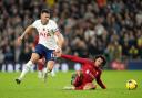Tottenham Hotspur's Ivan Perisic and Liverpool's Trent Alexander-Arnold battle for the ball