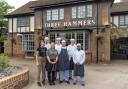 Staff outside the newly refurbished Three Hammers