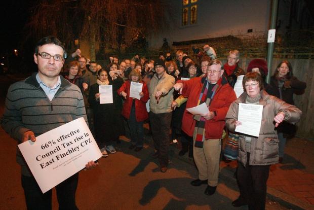 David Attfield, left, with other unhappy residents in the East Finchley CPZ