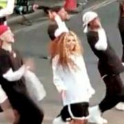 Video grab of ex-Little Mix singer Jesy Nelson appearing to film a new music video alongside a large dance group on August 4 on a street in Edgware. Credit: SWNS