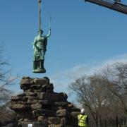 The statue being removed from its setting in Friary Park ahead of restoration work. Credit: Barnet Council