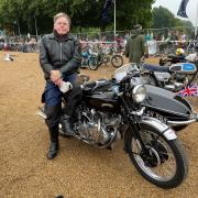 Peter Biles with his bike at the Platinum Jubilee parade. Credit: PA
