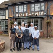 Staff outside the newly refurbished Three Hammers