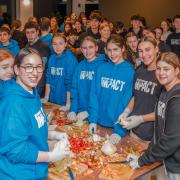 Young volunteers from 28 schools volunteering at Hendon's youth kitchen