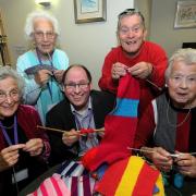 Jewish Care’s chief executive Simon Morris (centre) joins in knitting scheme for Mitzvah Day