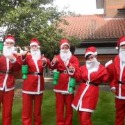Hospice supporters can raise money by wearing a Santa suit for the day