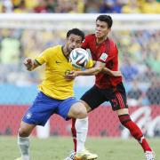 Hector Moreno (right) grapples with Brazil striker Fred (left). Picture: Action Images