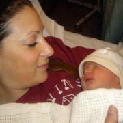 Caron with her newborn baby boy