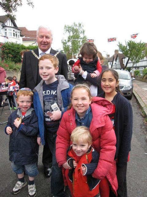 The Mayor of Barnet Cllr Brian Schama with children at Broughton Avenue, Finchley street party.