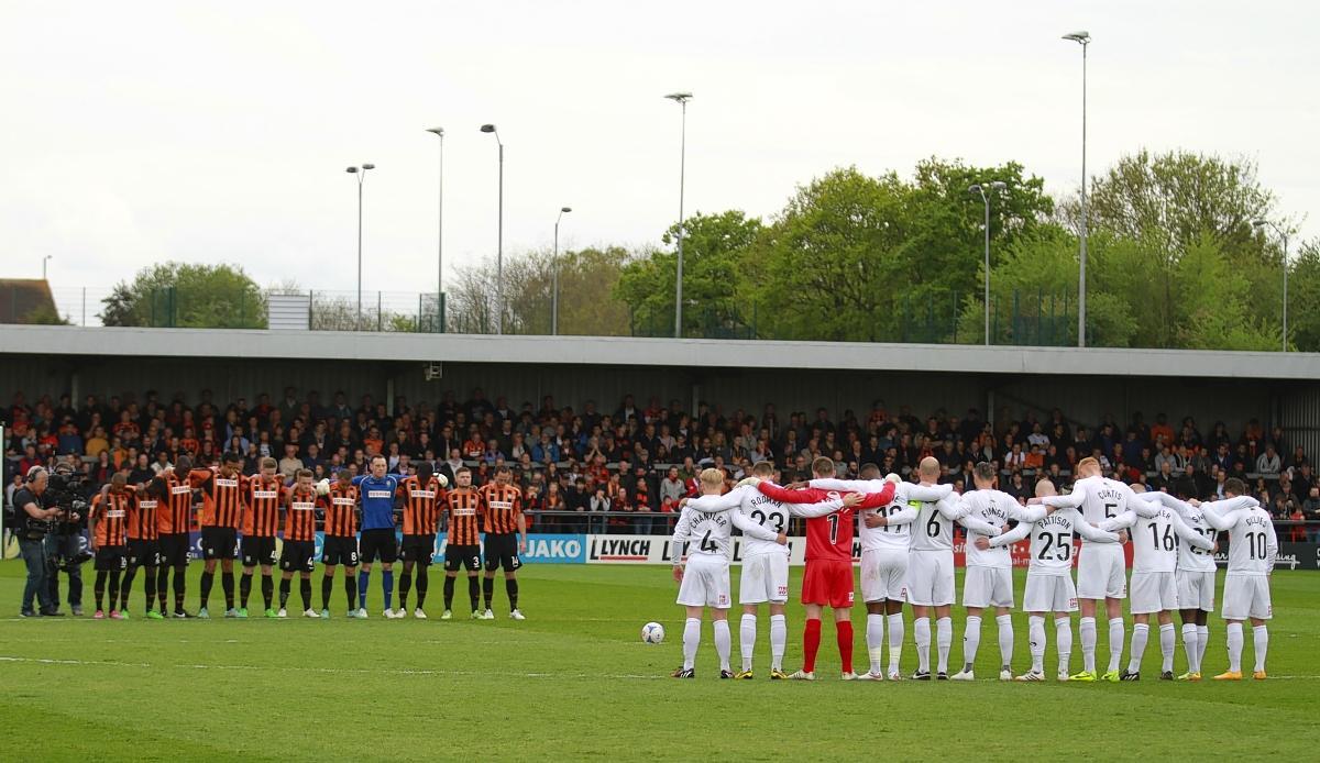 Both teams observed a minute's silence before the match