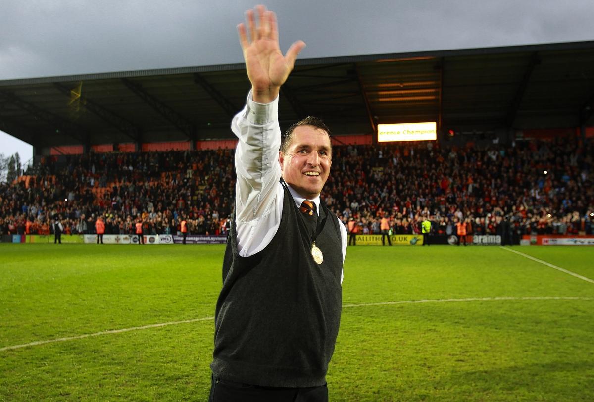 Barnet manager Martin Allen celebrates on the pitch