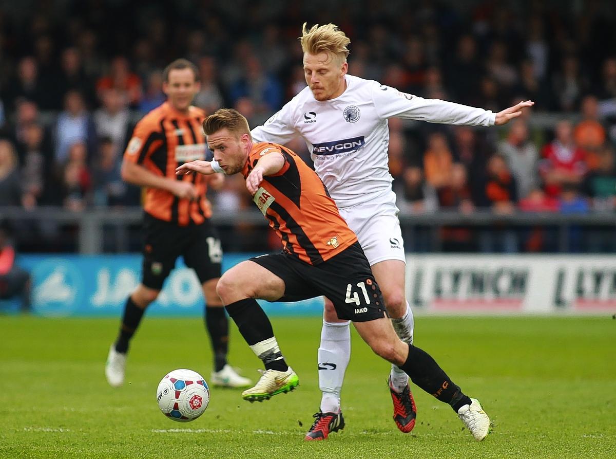 Barnet's Conor Clifford and Gateshead's Jamie Chandler in action