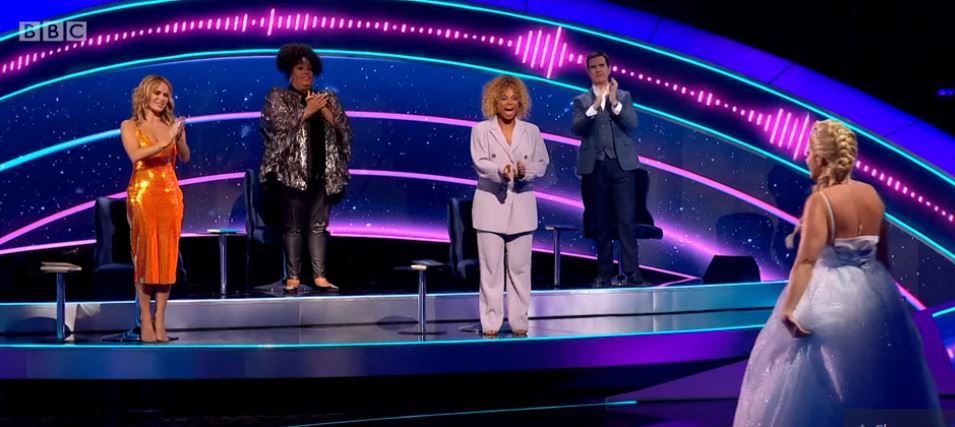 Denise Scott received a standing ovation from Amanda Holden, Amanda Hammond, Fleur East, and Jimmy Carr for her rendition of Into the Unknown. Credit: BBC