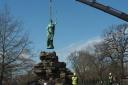 The statue being removed from its setting in Friary Park ahead of restoration work. Credit: Barnet Council