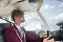 Flying high over north London... pupil learning to pilot a plane