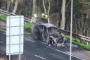 Firefighters at the scene of the fire on a M25 slip road today (February 25)