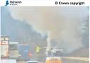 Firefighters tackle a vehicle fire causing long delays on the M25 between junctions 24 and 25.