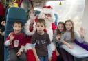 Mr Claus and his elves surprised children on board the First Capital Connect train to Brighton