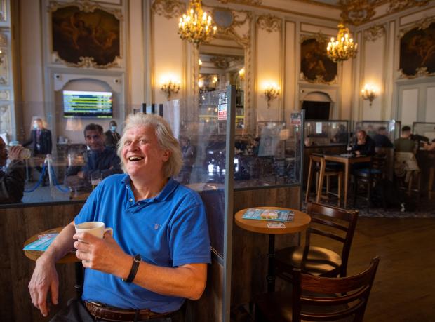 Times Series: Chairman Tim Martin hopes the prices will draw people back to pubs.