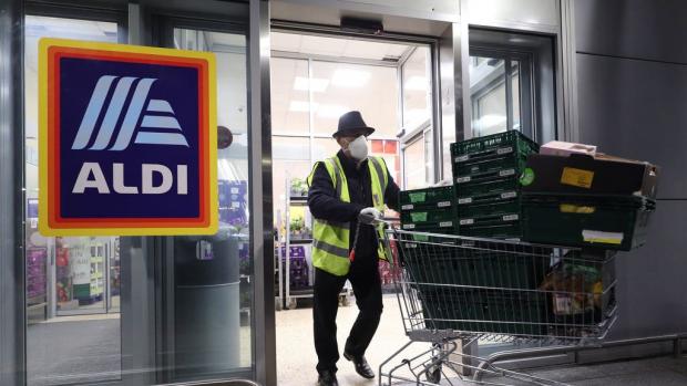 Times Series: Aldi asked all customers to wear a face mask when visiting UK stores. (PA)