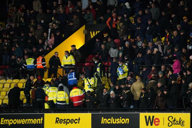 Watford and Chelsea players were forced to return to the dugout due to a medical emergency in the Graham Taylor stand nine minutes into the game at Vicarage Road