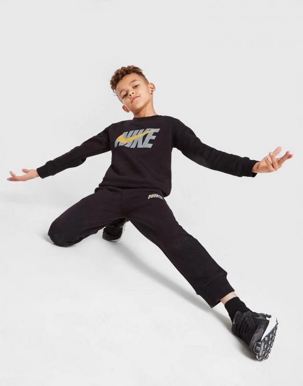 Times Series: Nike Club Crew Tracksuit for Children. Credit: JD Sports