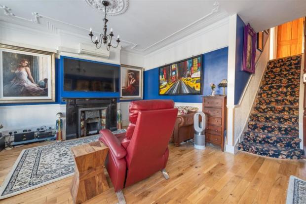 Times Series: The large living room. (Rightmove)