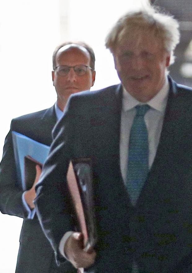 Times Series: Martin Reynolds (back) and Boris Johnson (PA)