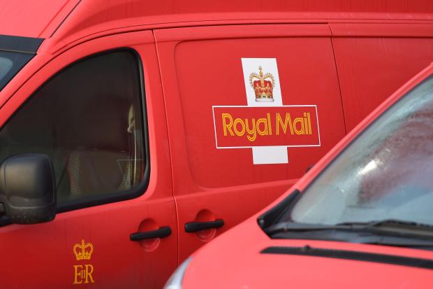 Times Series: Royal Mail van. Credit: PA