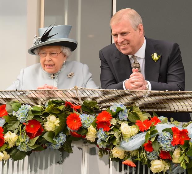Times Series: (left to right) Queen Elizabeth II and Prince Andrew. Credit: PA