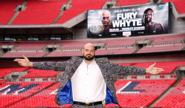 Times Series: Tyson Fury poses on the pitch after the press conference at Wembley Stadium, London (PA)