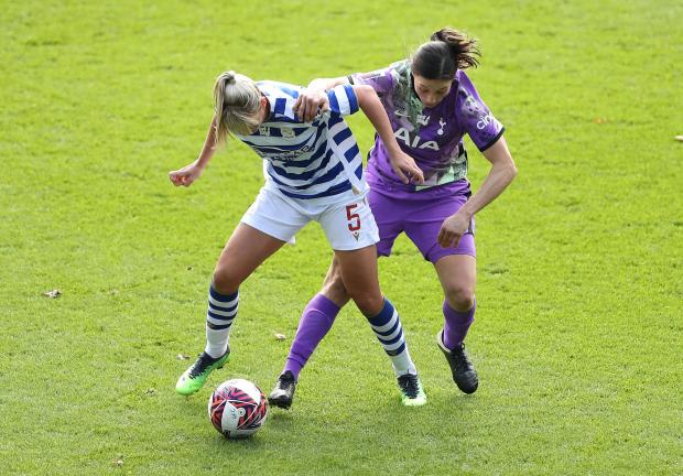 Times Series: Reading's Gemma Evans (left) and Tottenham Hotspur's Rachel Williams battle for the ball during the Barclays FA Women's Super League match at the Select Car Leasing Stadium, Reading. Photo via PA/Bradley Collyer.