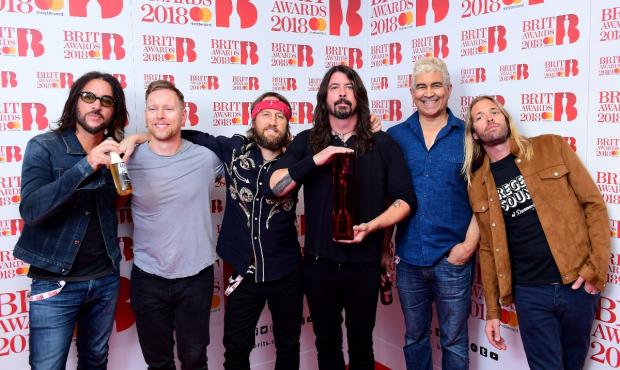 Times Series: Foo Fighters with their award for Best International Group during the 2018 Brit Awards (PA)