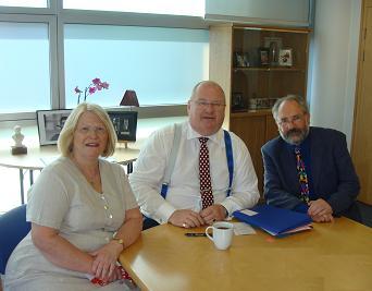 secretary of state for communities and local government, MP Eric Pickles (middle) with Councillors Kate and Brian Salinger
