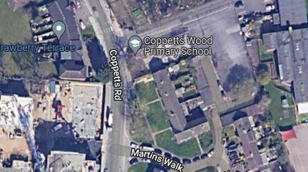 Times Series: Aerial view of the development site next to Coppetts Wood Primary School. Credit: Google Maps