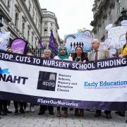A protest is held in central London calling for more funding for early years nurseries. Credit: PA