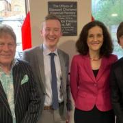 Filip Slipaczek pictured with his sons Alex and Max and Chipping Barnet MP Theresa Villiers. Credit: Roger Aitken