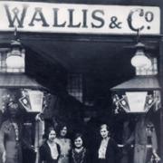 Open for business: Staff outside a Wallis & Co. shop in Gravesend, in 1927.
