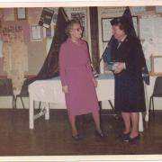 Edith Moran presenting Thelma Harris with her retirement gift in 1981 after more than 40 years as 4th Friern Barnet Guide Captain