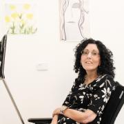 The mum-of-two paints using sophisticated eye tracking technology
