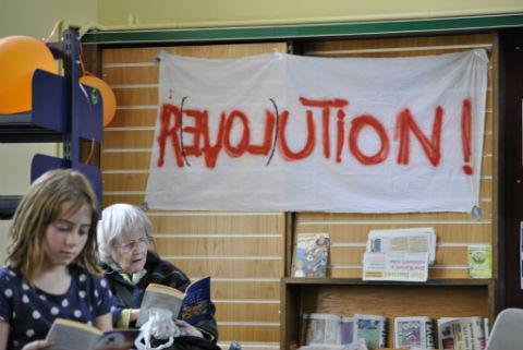 Squatters gained access to the empty building in September and have since helped a number of community groups set up their own library. Pic: Joanna Murray